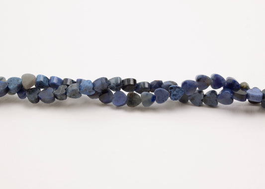 Front horizontal view of a Lapis Lazuli heart beaded necklace on a white background