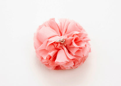 Rich pink flower connector and charm with pearled white glass bead trio in the centre on a white background.