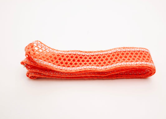 Front view of a folded cotton fishnet ribbon in orange and white with Sterling Silver looped endings on a white background